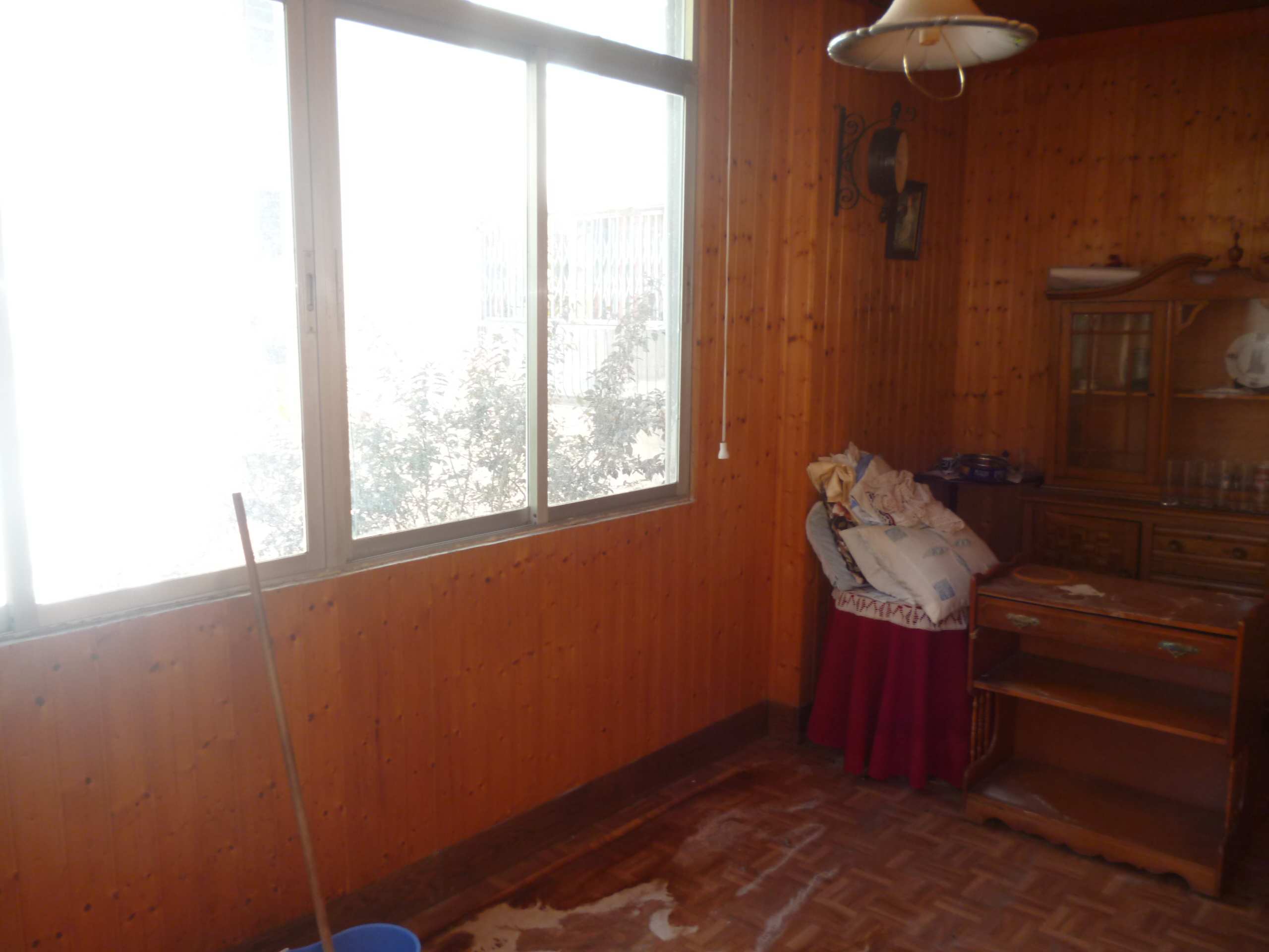 House with attic and interior patio area with land in the center of Miranda